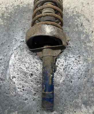 Citroen Berlingo Front shock absorber with coil spring