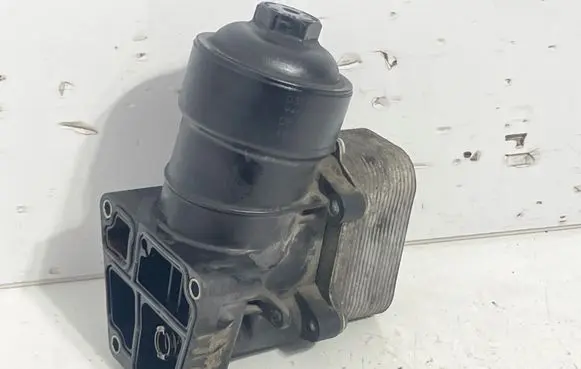 Volkswagen Polo IV 9N3 Oil filter mounting bracket 03L117021C