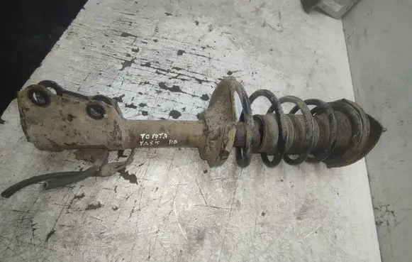 Toyota Yaris Front shock absorber with coil spring