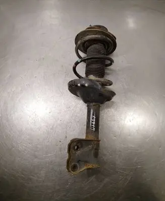 Subaru Legacy Front shock absorber with coil spring