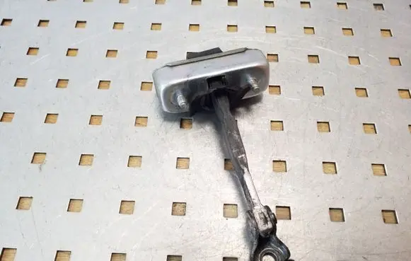 Toyota Land Cruiser (J120) Rear door check strap stopper
