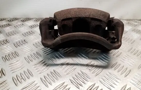 Nissan Juke I F15 Front brake caliper