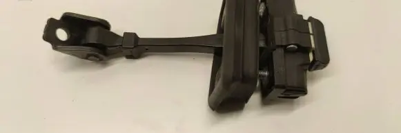 Rear door check strap stopper