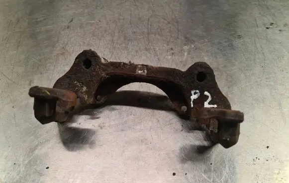Saab 9-3 Ver2 Front Brake Caliper Pad/Carrier 