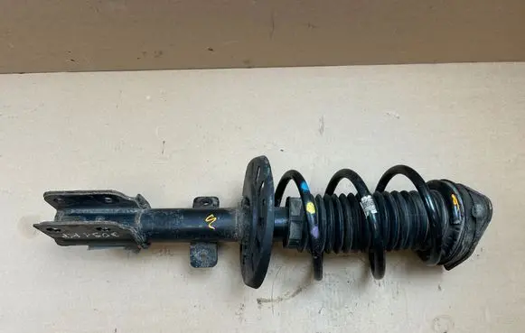 Opel Combo E Front shock absorber with coil spring 9833306080