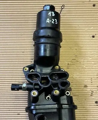 Skoda Octavia Mk2 (1Z) Oil filter mounting bracket 06F115397F
