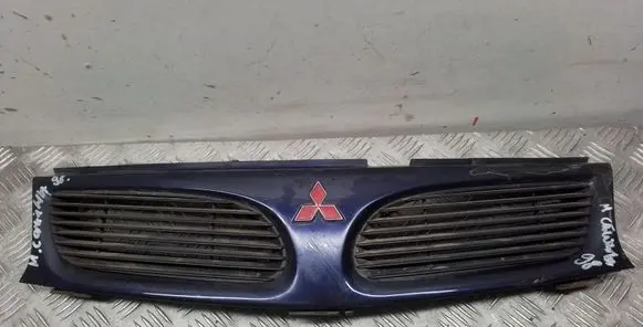 Mitsubishi Carisma Front bumper upper radiator grill MB9444763