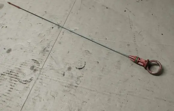 Oil level dip stick