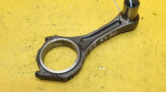 Piston with connecting rod