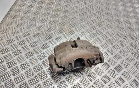 Volkswagen PASSAT B7 Front brake caliper