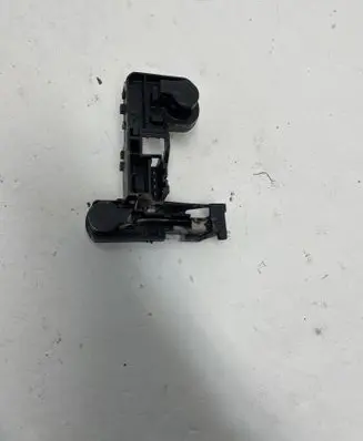 Tail light bulb cover holder