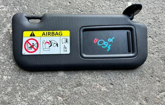 Toyota Corolla E210 E21 Sun visor braknumeruczci