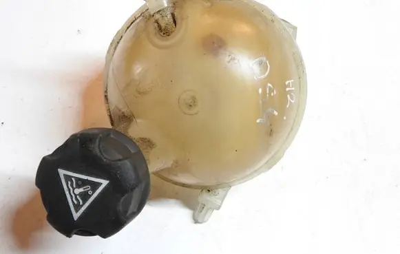 Coolant expansion tank/reservoir