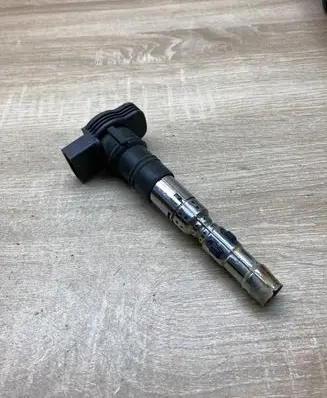 Volkswagen Touareg I High voltage ignition coil 077905115AA
