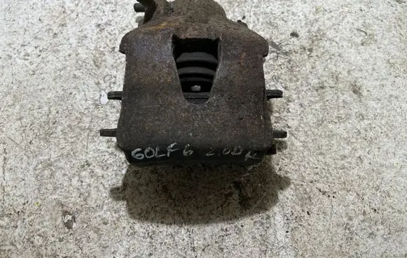 Volkswagen Golf VI Front brake caliper
