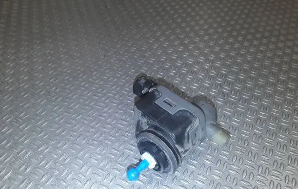 Nissan Tiida C11 Headlight level adjustment motor 7700420737