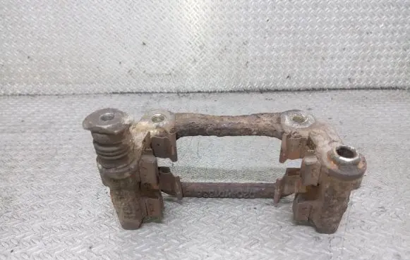 Toyota Avensis T250 Brake caliper pad carrier rear 