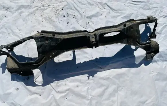 Radiator support slam panel