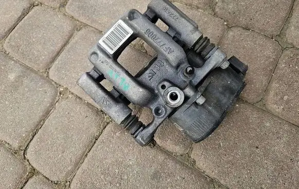 Opel Astra L Rear brake caliper 9819059380