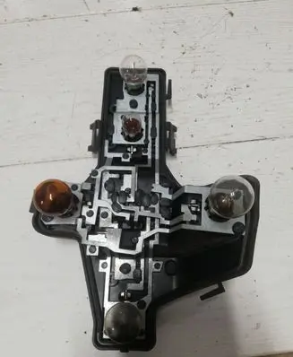 Volkswagen Touran I Tail light bulb cover holder