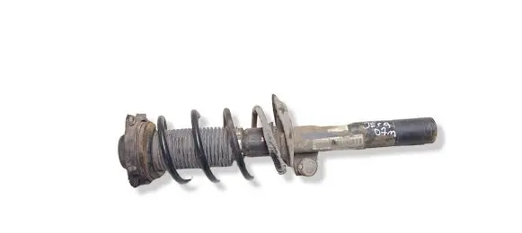 Volkswagen Jetta V Front shock absorber with coil spring 1K040039