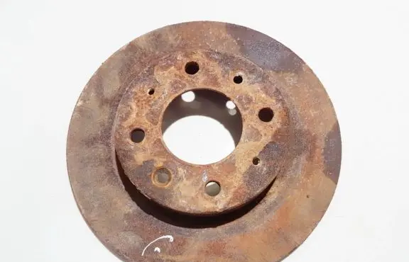 KIA Carens I Rear brake disc neventiliuojamas