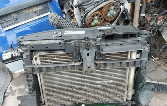 Radiator support slam panel