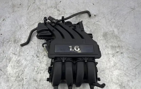 Volkswagen Golf Plus Intake manifold 06A133203EM