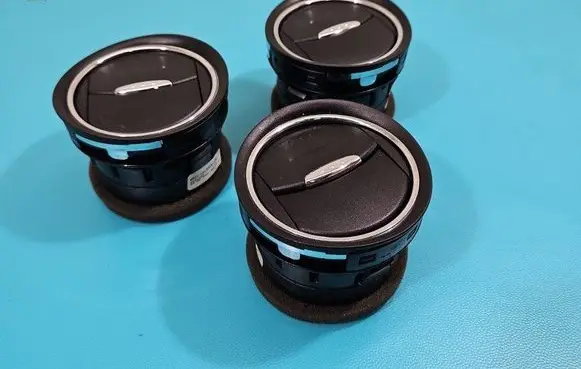 Dash center air vent grill