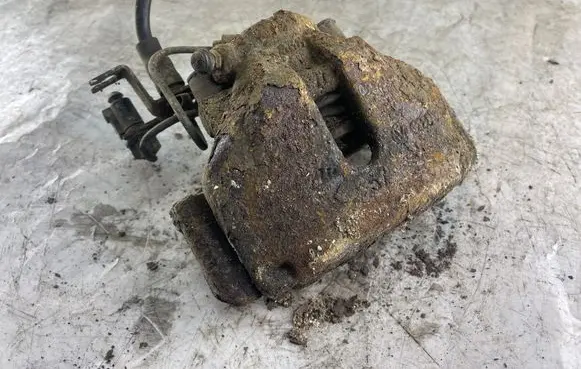 Volkswagen PASSAT B5 Front brake caliper