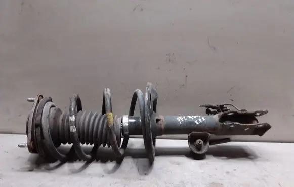 Front shock absorber with coil spring