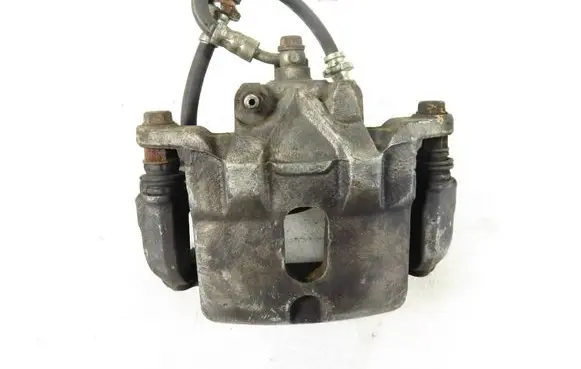 Nissan Maxima A34 Front brake caliper 