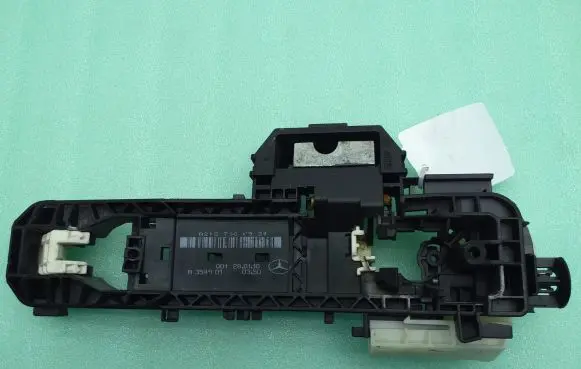 Rear door exterior handle/bracket