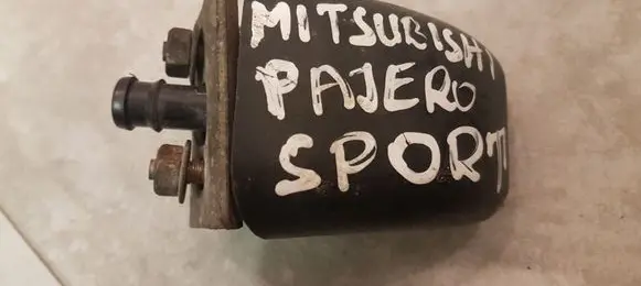 Mitsubishi Pajero Sport I Headlight washer spray nozzle