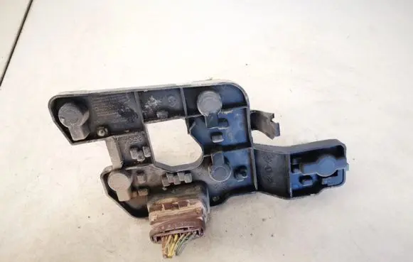 Tail light bulb cover holder