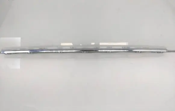 Rear bumper trim bar molding