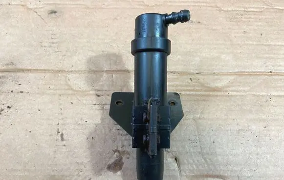 Headlight washer spray nozzle