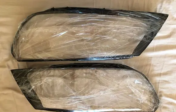 Volkswagen Touareg II Headlight lense 
