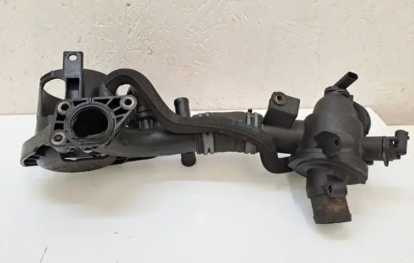 Thermostat/thermostat housing