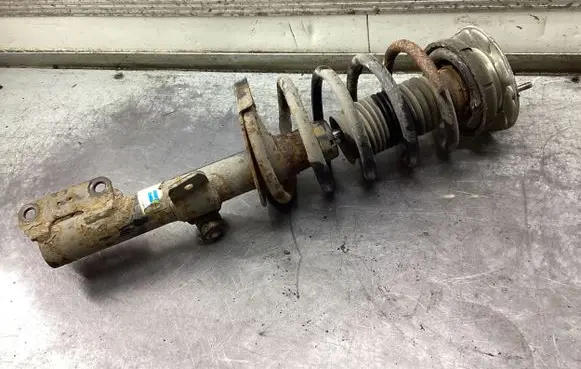 Volvo XC90 Front shock absorber with coil spring