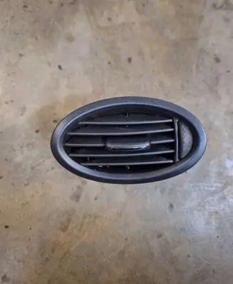 Dashboard side air vent grill/cover trim