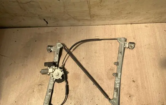 Mitsubishi Colt Front door window regulator with motor 