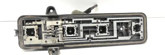 Tail light bulb cover holder