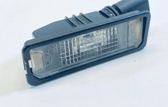 Volkswagen Golf VII Number plate light 1K8943021
