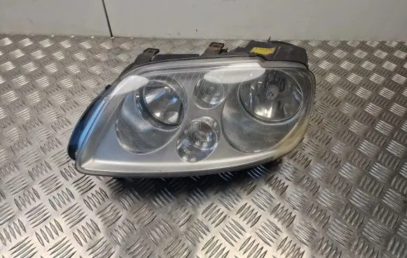 Volkswagen Touran I Headlight/headlamp 1T0941005M
