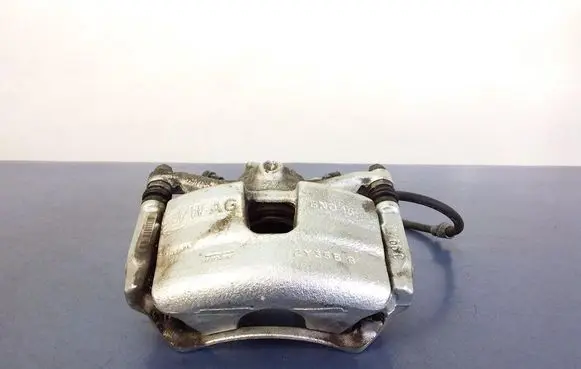 Volkswagen Golf Sportsvan Front brake caliper 