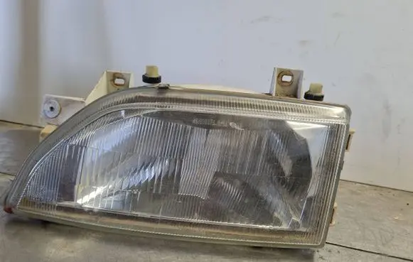 Ford Escort Headlight/headlamp 7R0145487 E31750245486