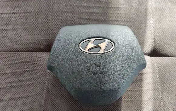 Steering wheel airbag