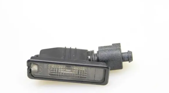 Volkswagen PASSAT B7 Number plate light 1K8943021