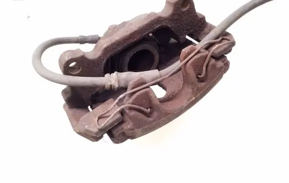 Volkswagen Golf VI Front brake caliper